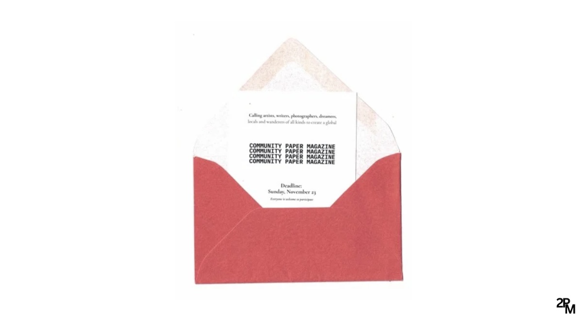 The first open call flyer placed inside a small red envelope